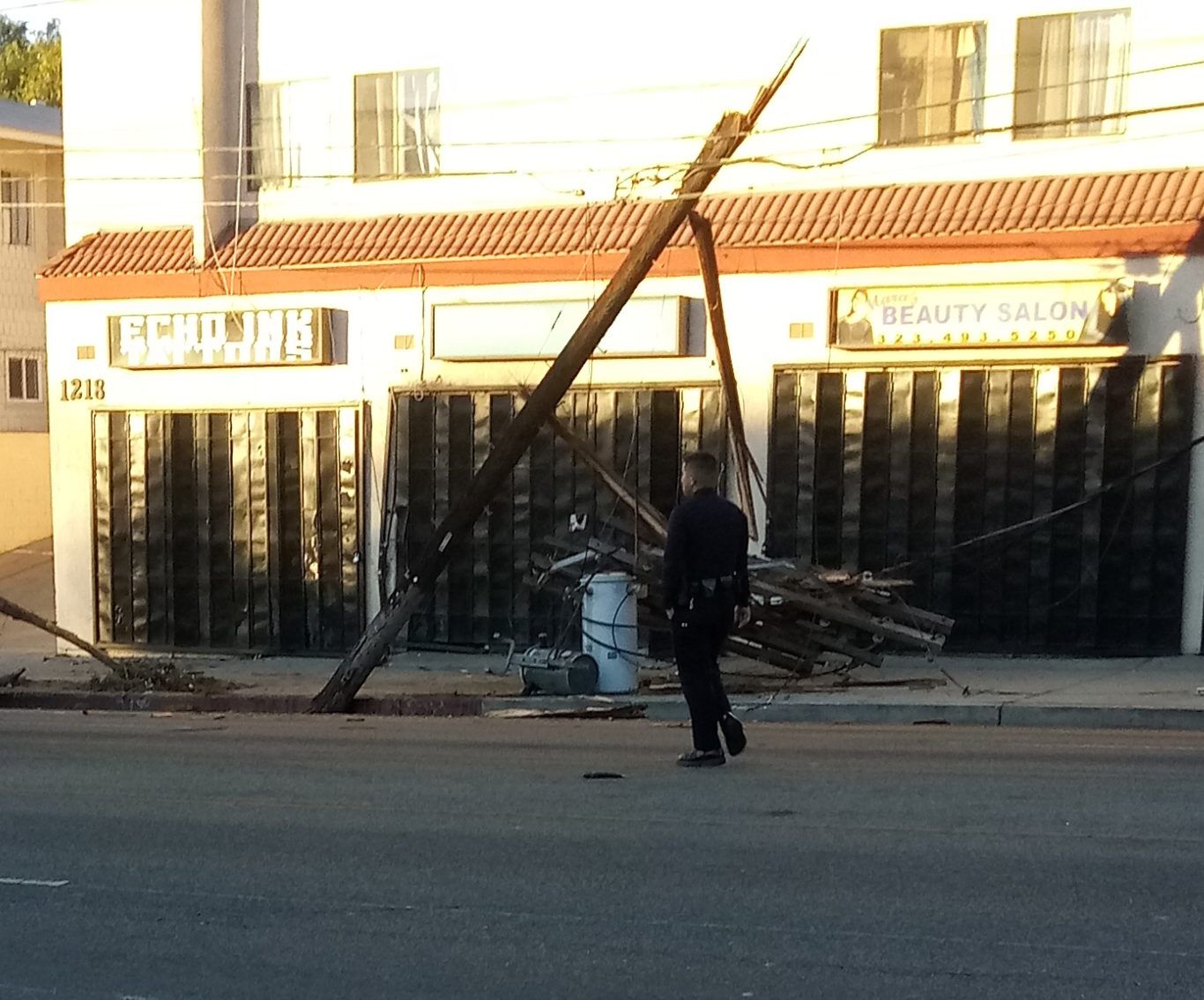 Damaged utility pole and lines